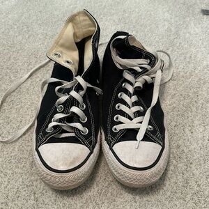 Black High-top Chuck Taylor’s 10